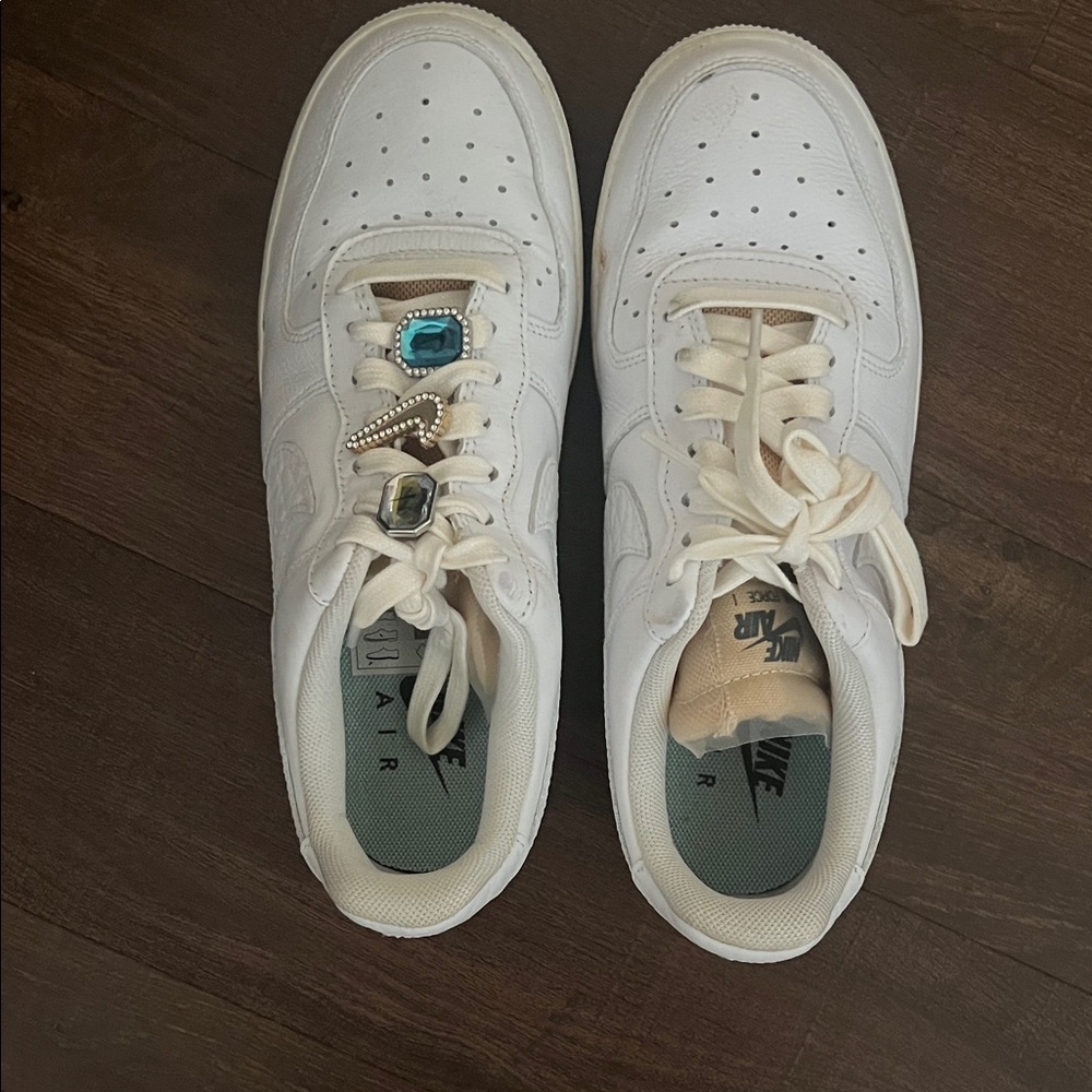 Nike White Sneakers with Blue and Silver Accents